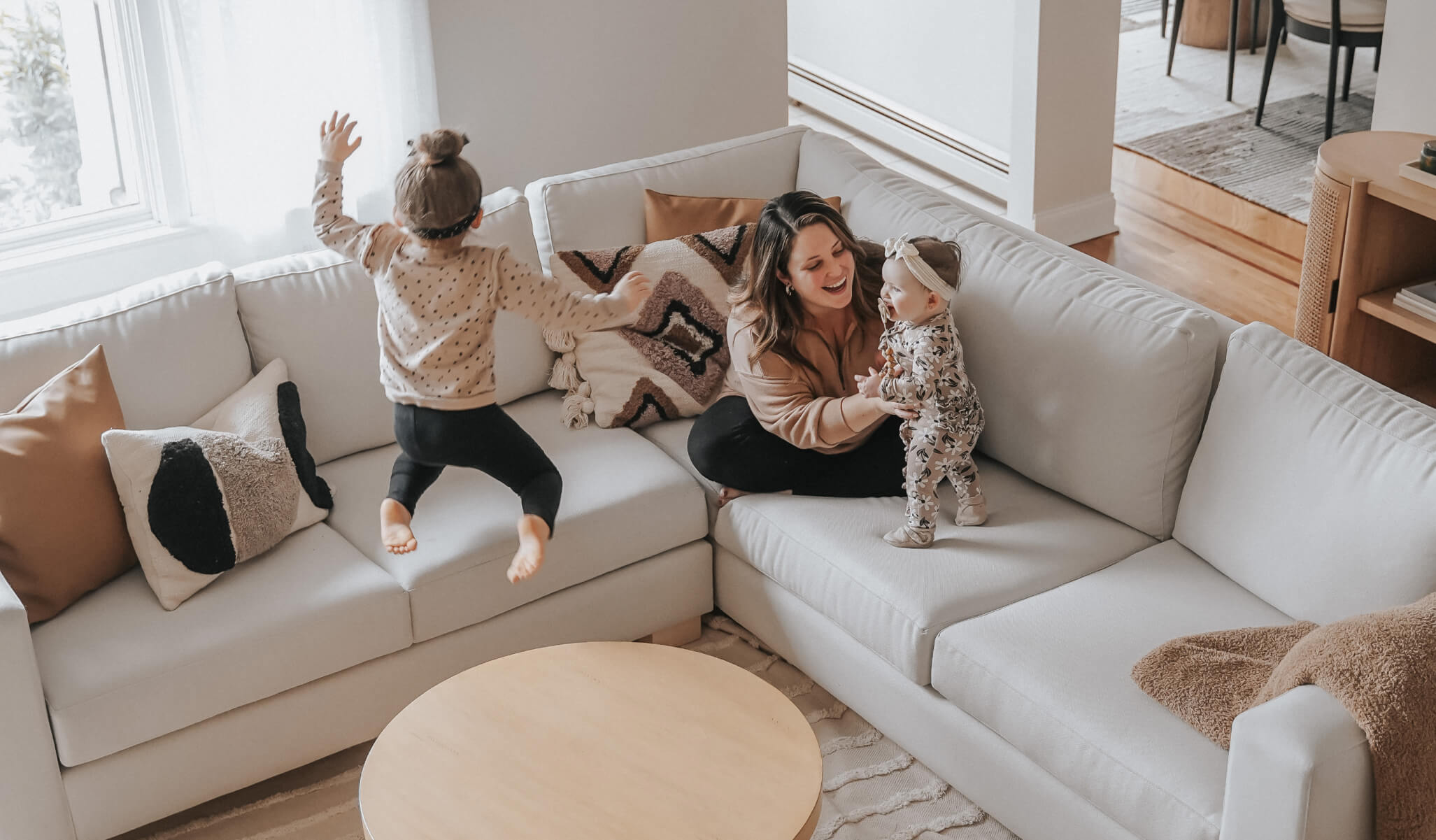 IRL: Rio Corner Sectional 99" x 99", shown here in Alpine Oyster fabric with Dave 3"H Maple Legs. Image courtesy of @lizeidelman