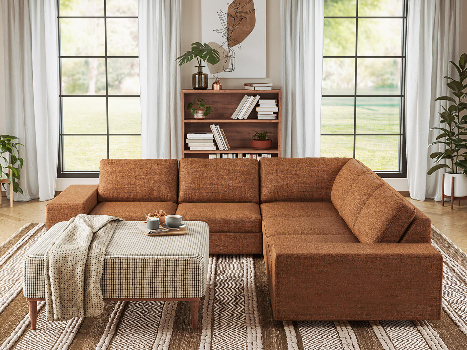 IRL: Blumen Corner Sectional in Buckbrush Tweed fabric, Noah Ottoman, Anders Shelf in Walnut