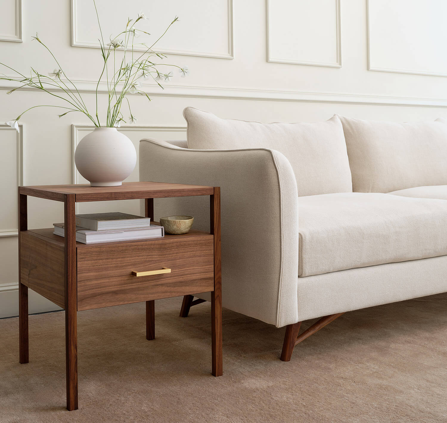 IRL: Shown in walnut with the Gio Sofa