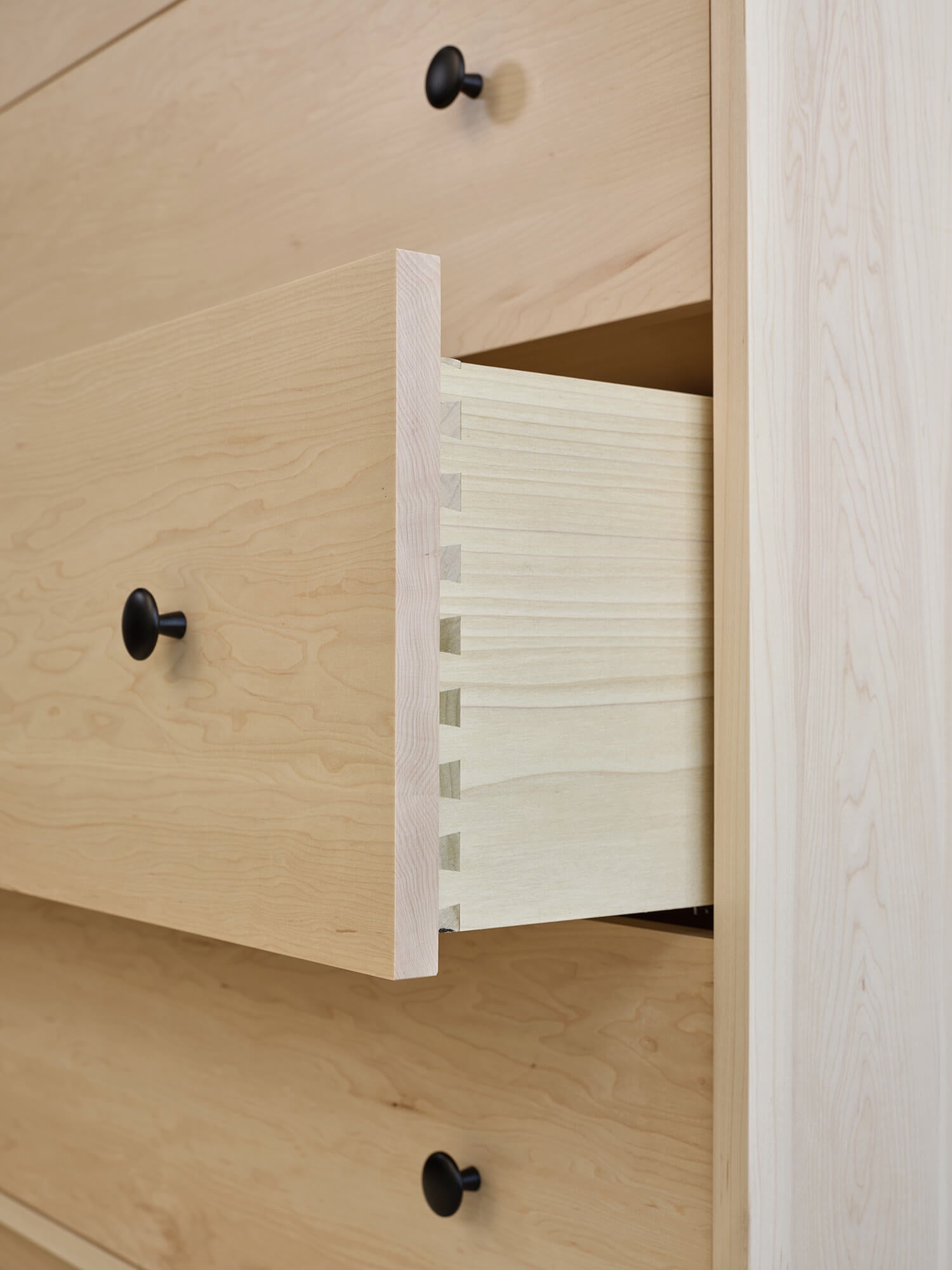 IRL: Atten 4-Door Tall Dresser in maple wood