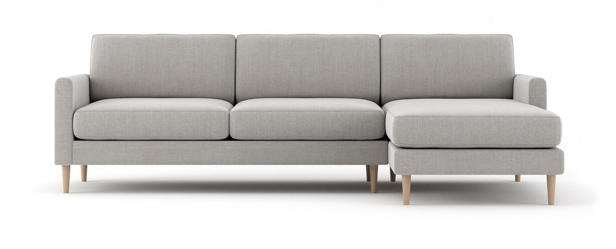 G: Lala Chaise Sectional shown in linara porridge fabric and Thom Maple legs
