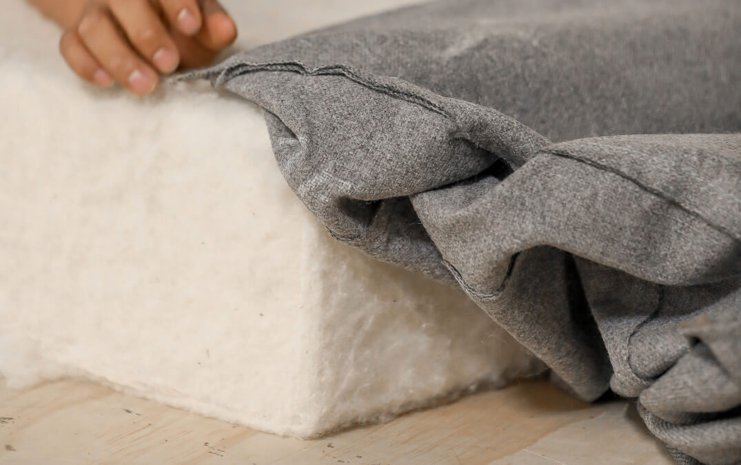 wool cushion being upholstered