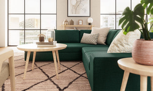 IRL: Blumen Bumper Left Sectional in Juneberry Spruce Peacock fabric, Voya Coffee Table, Iris 3-Tier Shelf, Burr Accent Chair, Lulu & Judge Throw Pillows