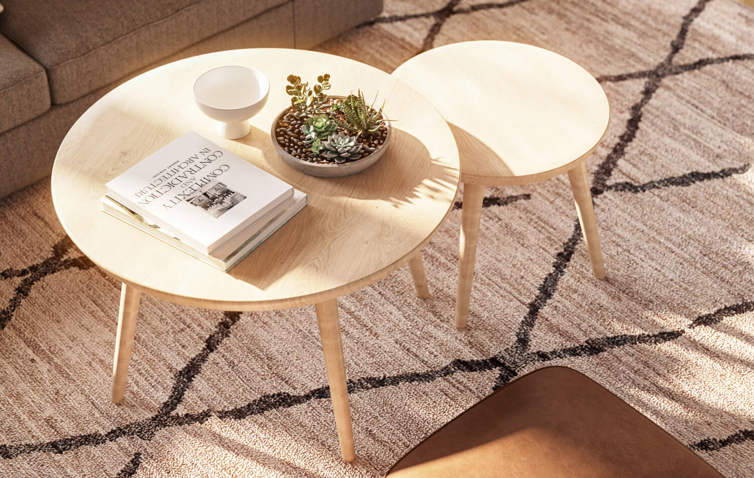 IRL: Voya Coffee Table nested with the Voya Side Table, both in solid maple wood