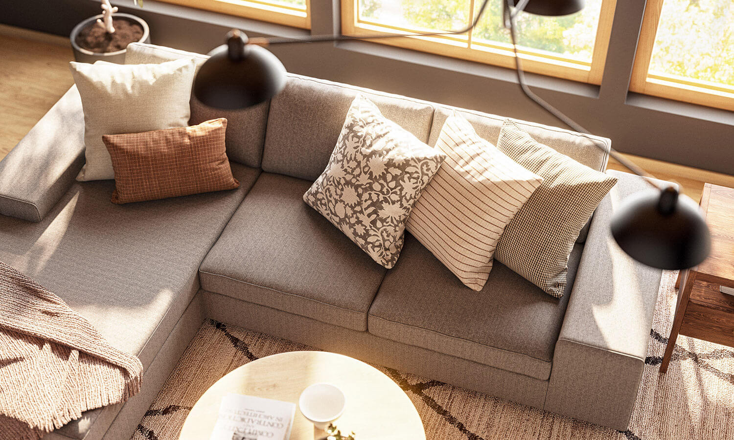 IRL: Shown in C.O.M. fabric, Voya Coffee and Side Tables, Mayer Poufs in Milo Taupe leather, and Lulu & Judge Throw Pillows