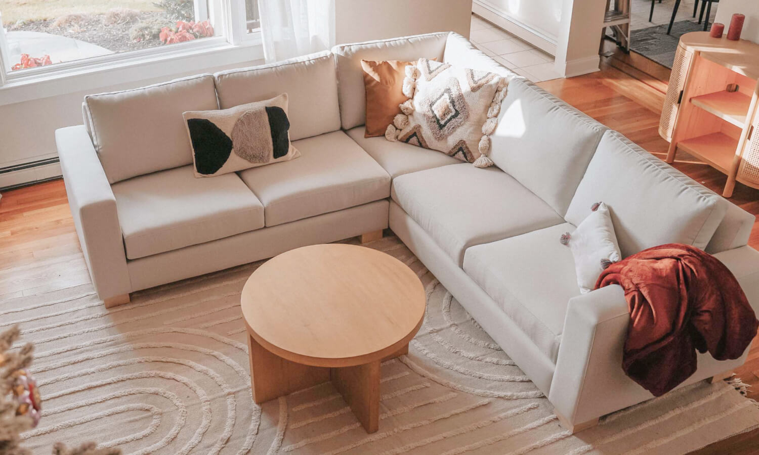 IRL: Rio Corner Sectional 99" x 99", shown here in Alpine Oyster fabric with Dave 3"H Maple Legs. Image courtesy of @lizeidelman