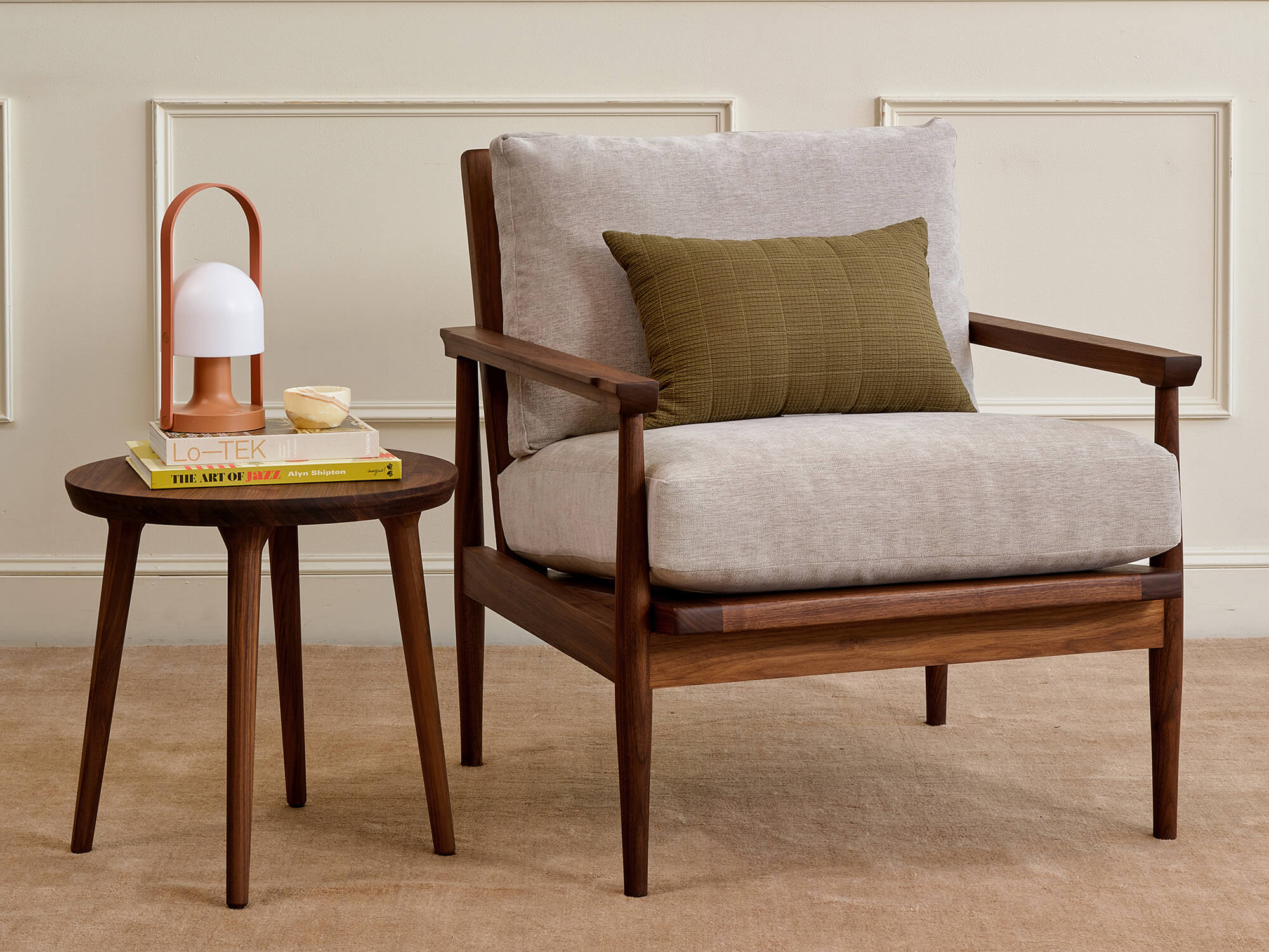 IRL: Shown in walnut alongside the EIM Chair