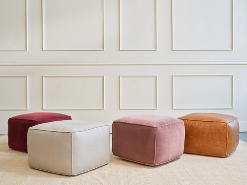 IRL: Mayer Pouf shown in Aster Velvet Rosewood, Larkspur Pearl, Aster Velvet Raisin, and Bodie Chestnut Leather.