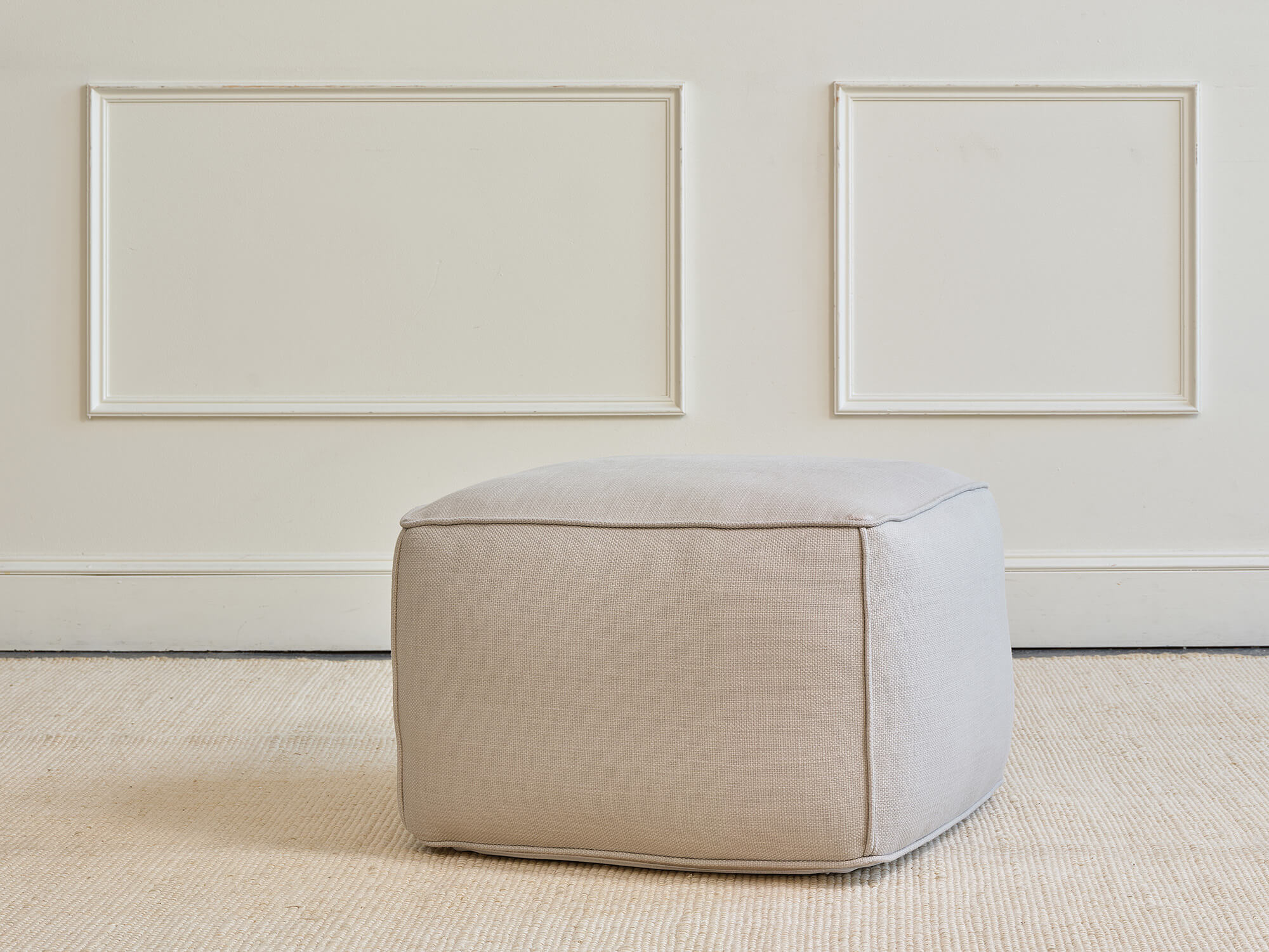 IRL: Mayer Pouf in Stonecrop Linen Natural fabric.