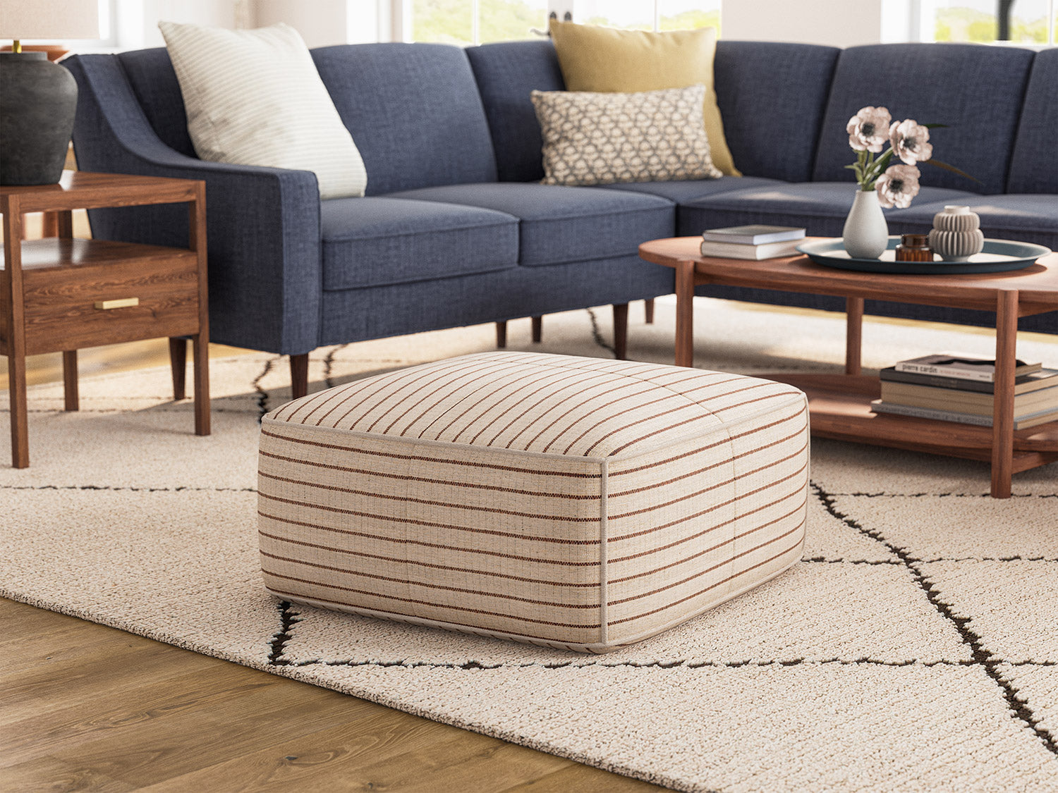 IRL: Mosh Ottoman in Sirsi fabric with the Zavis Corner Sectional in Smart Navy fabric