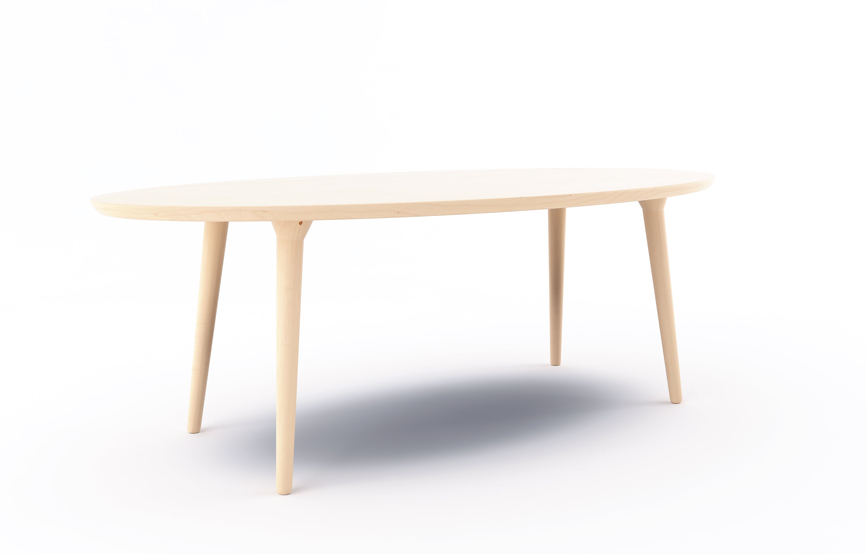 Voya Oval Dining Table in Maple from angle