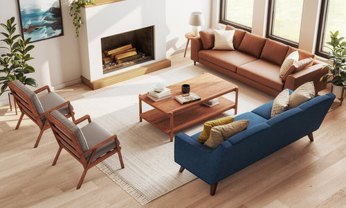 IRL: Zavis Sofa in Mahonica Denim fabric with Iris Coffee Table, Ridge Accent Chairs in Aster Velvet Taupe fabric, Dekayess Sofa in Milo Taupe leather