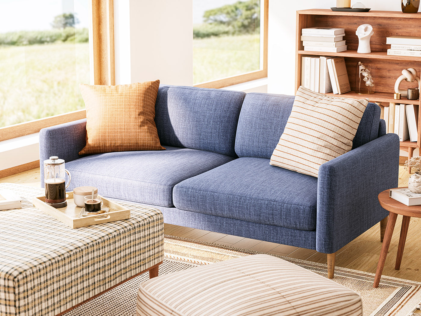 G: Lala Sofa in Smart Navy fabric, Noah Ottoman in Arya fabric, Mosh Ottoman in Kasuri fabric