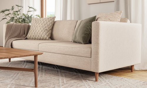 IRL: Mota Sofa shown in Alpine Dove fabric and Thom Cafe legs
